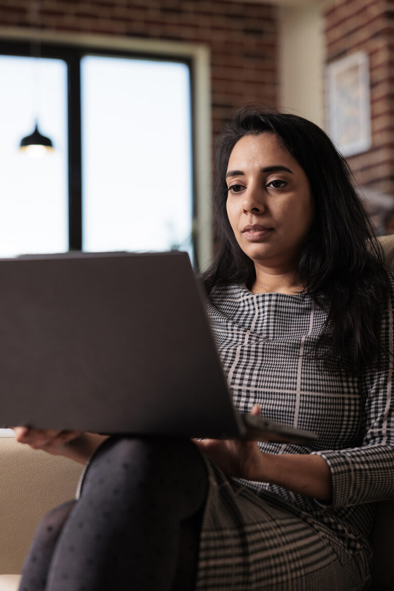 Person on laptop | Online Counselling